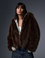 Blouson fourrure à capuche
