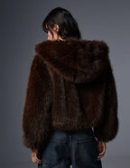 Blouson fourrure à capuche