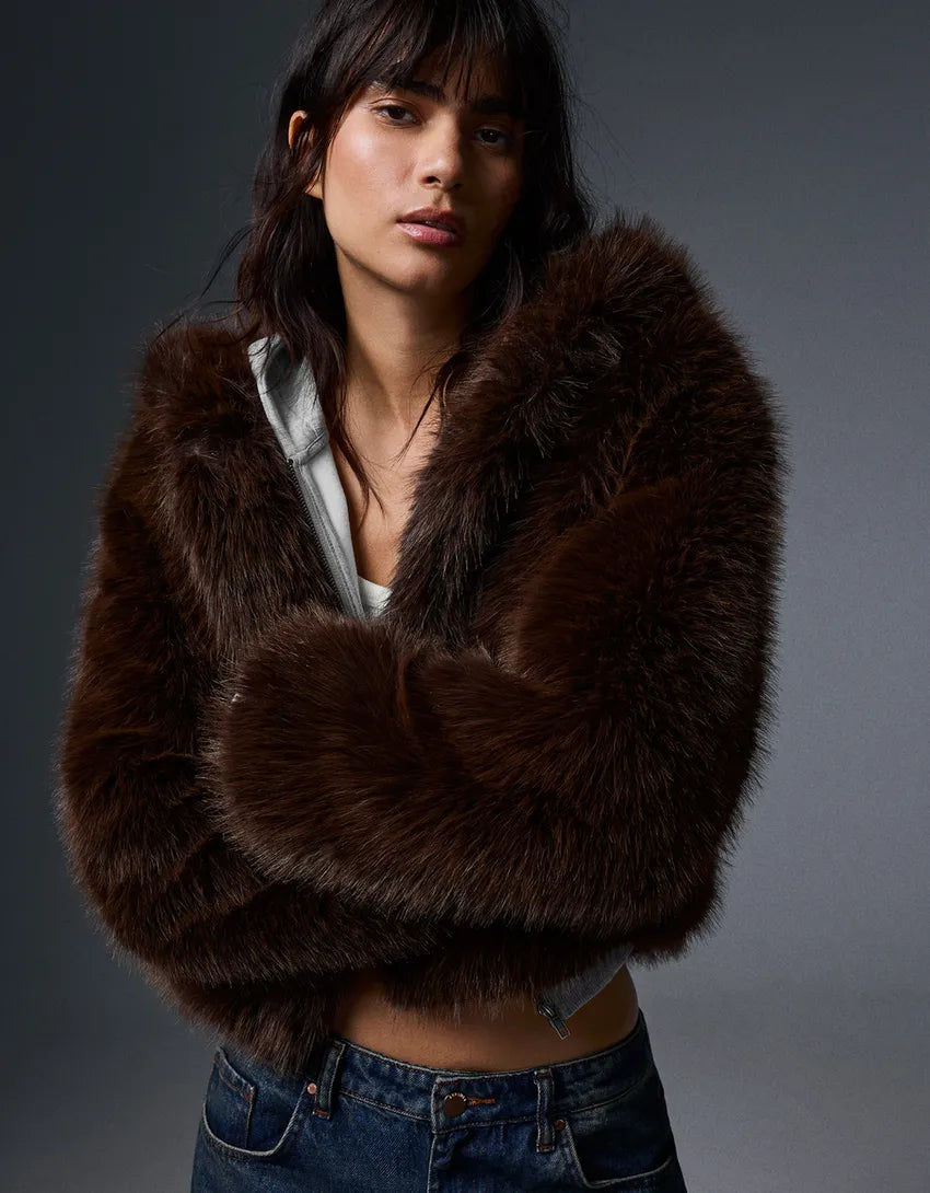 Blouson fourrure à capuche